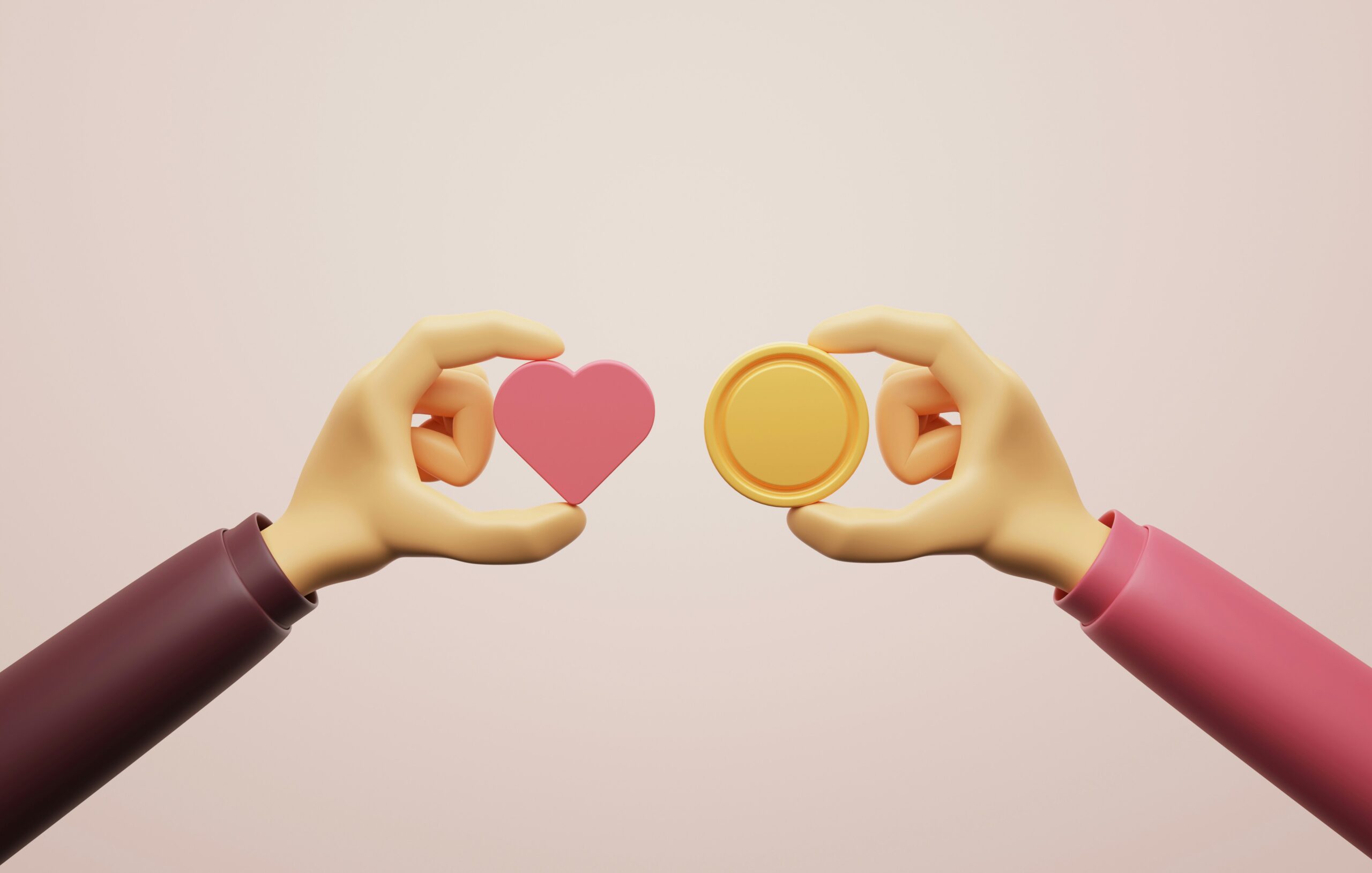 due mani, una tiene un cuore e l'altra una moneta